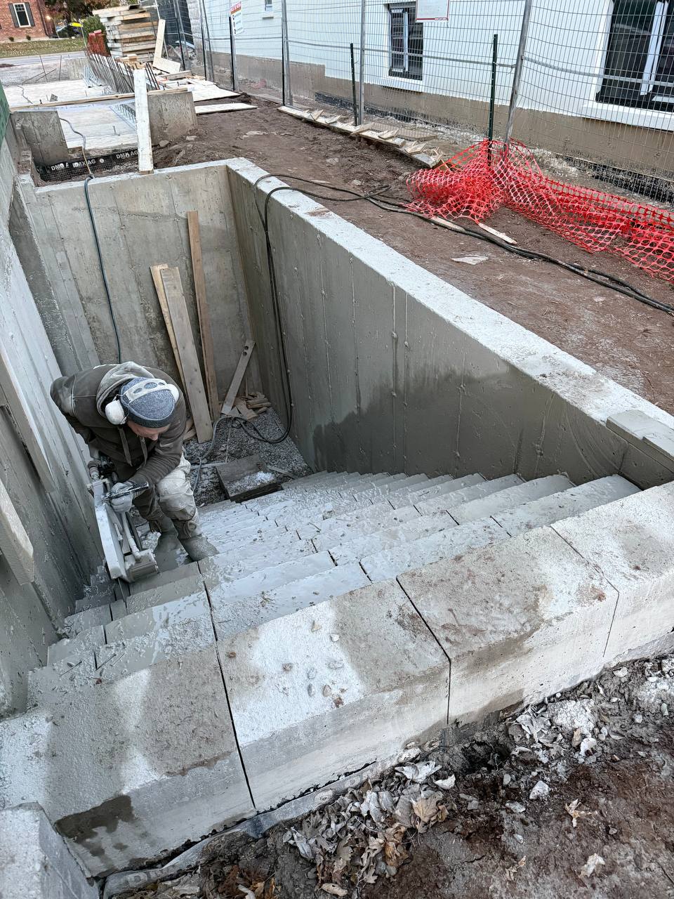 cutting concrete stairs and wall with precision saw